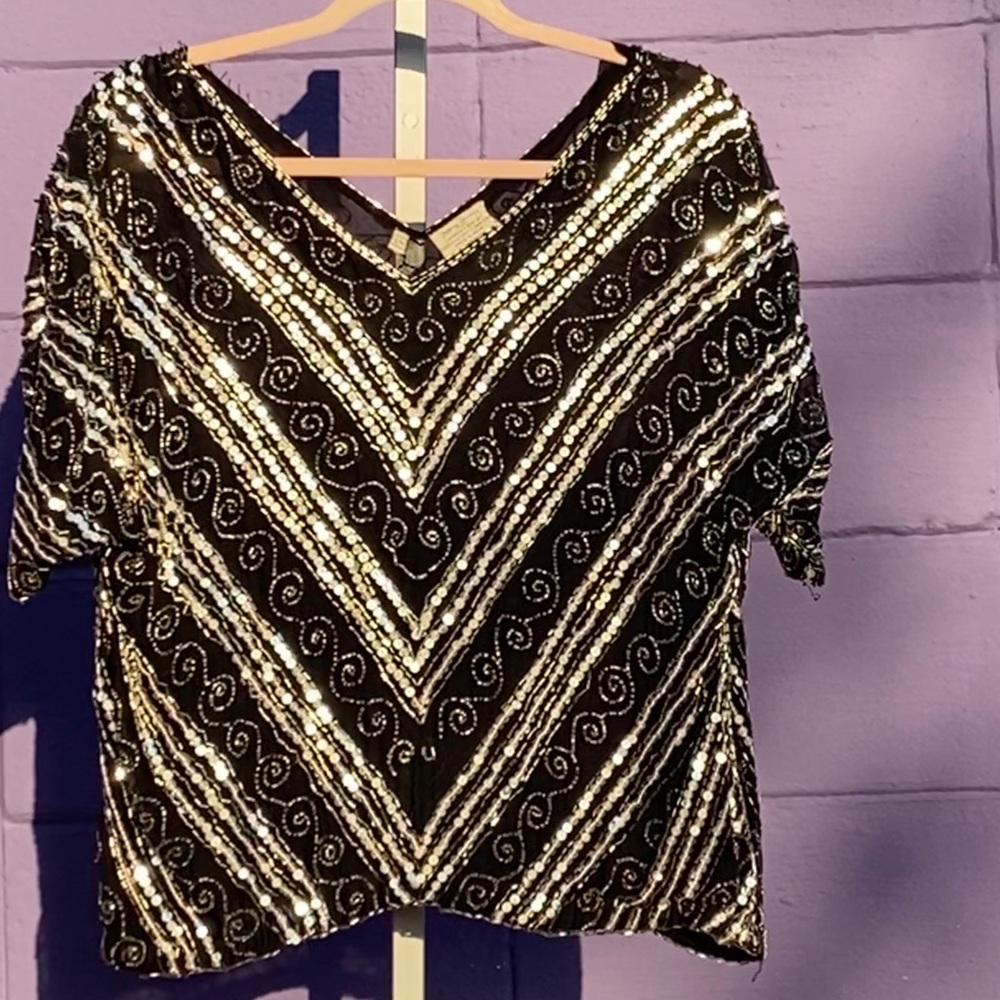 Jeffery Laurence Top